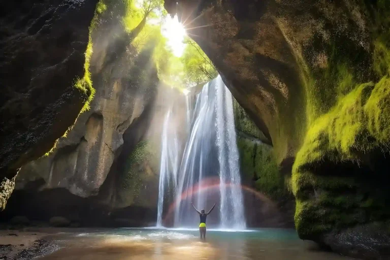 Light shaft falling through the cave at Tukad Cepung waterfall